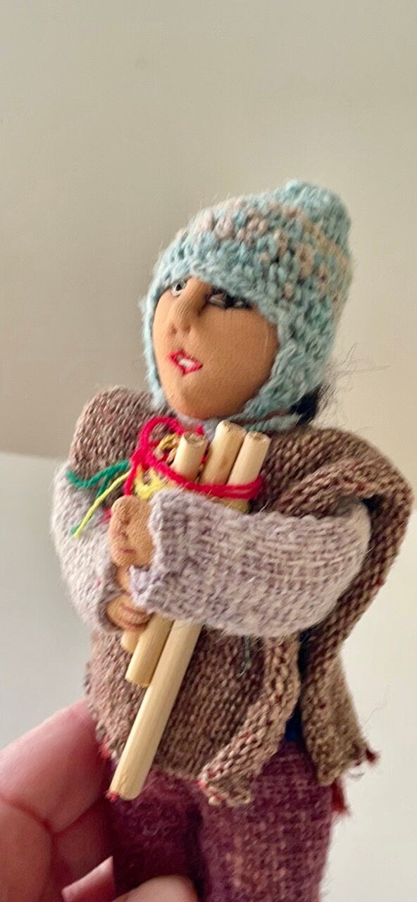 Vintage Bolivian man playing panpipes - collectible folk art doll with handmade woven wool clothing
