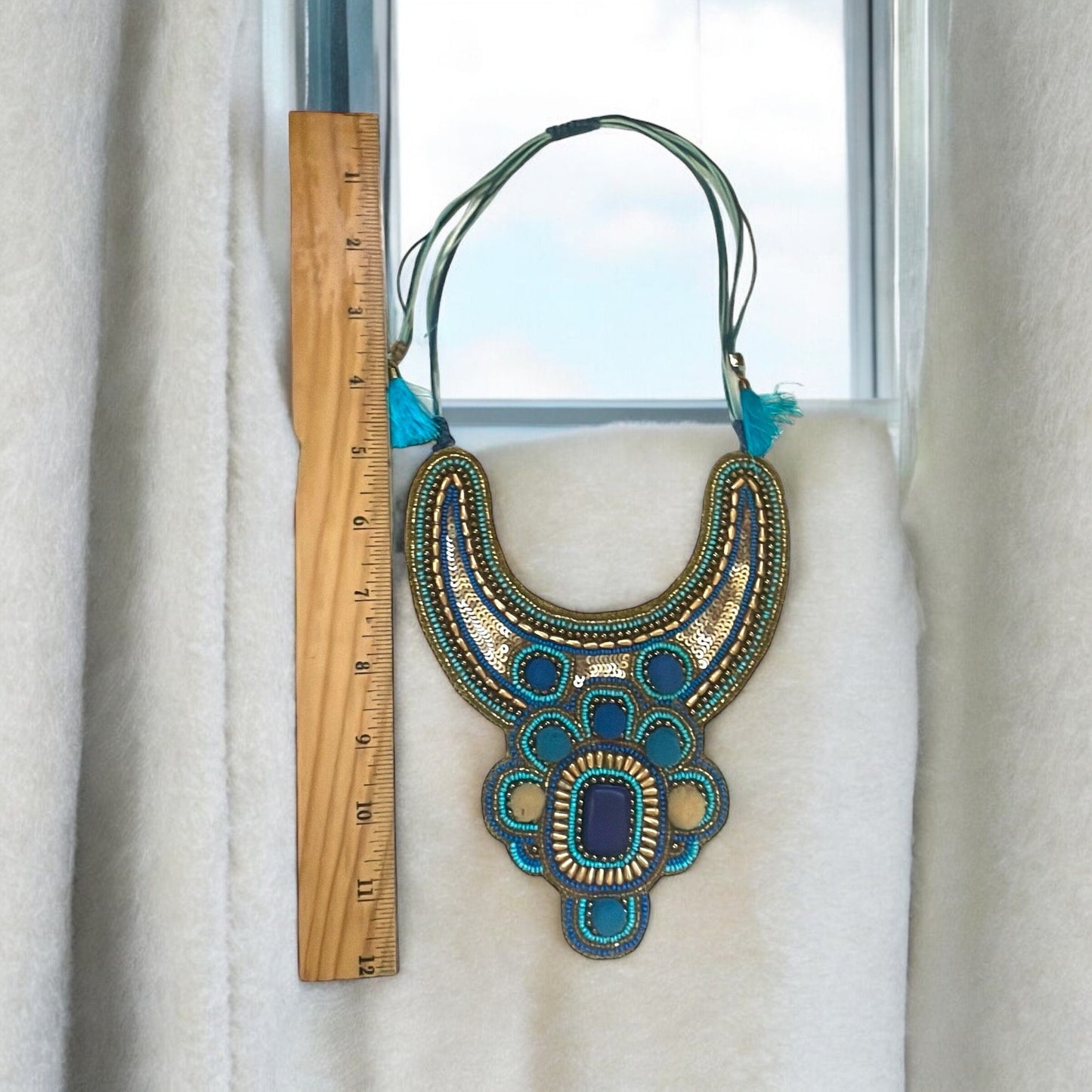 Stunning beadwork necklace - mixed materials with sequins, pom poms and beads - turquoise
