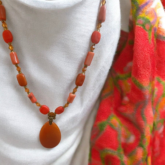 Stunning orange coral colored vintage beaded necklace
