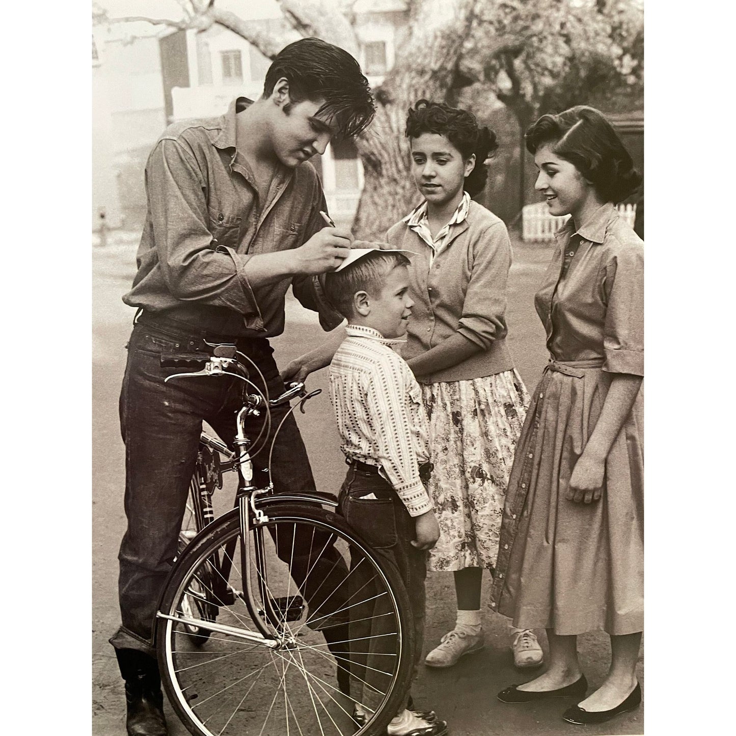 Legendary Rock 'N Roll - Elvis Presley signing autographs - print from vintage book - 12" x 10"