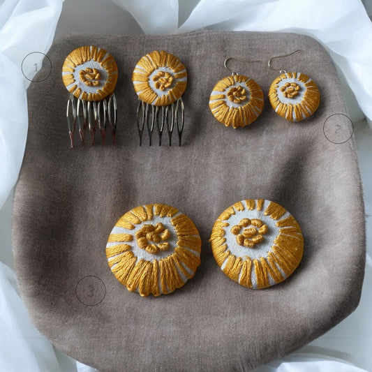 Choice of stud earrings, dangle earrings, hair combs, shanked buttons or pins all hand made from a vintage linen embroidered table runner