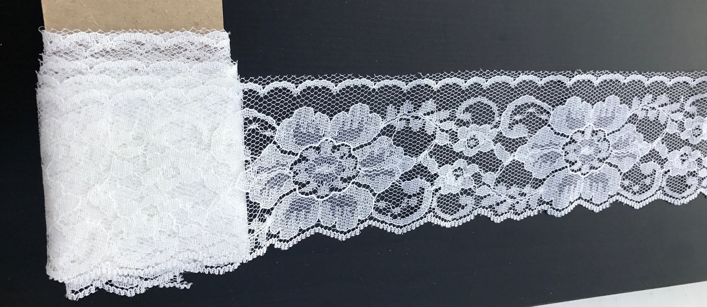 Wide (2 and one-half inches wide) vintage white lace - by the yard
