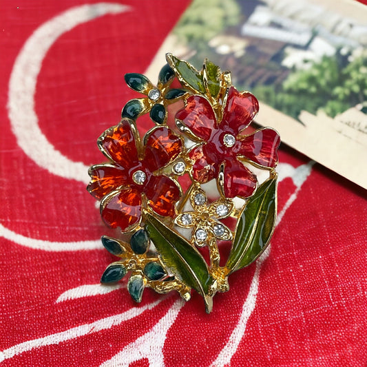 Stunning enamel floral pin with rhinestones
