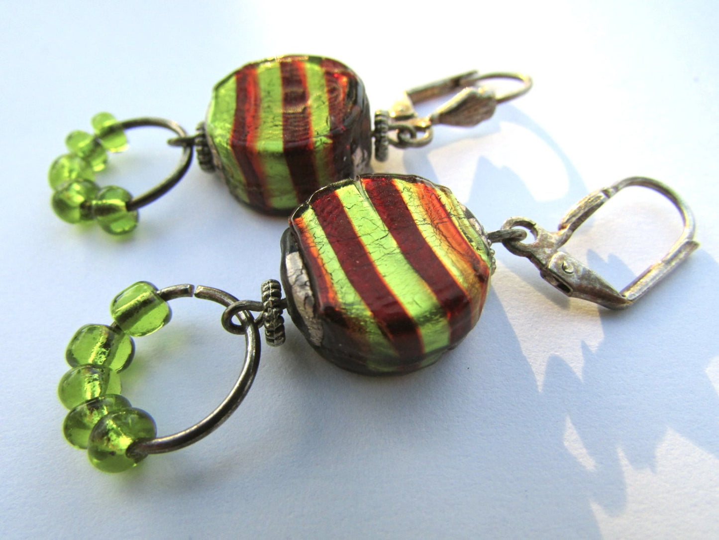 Stunning striped artisan glass and lime-toned green glass dangle hoops - vintage artisan earrings
