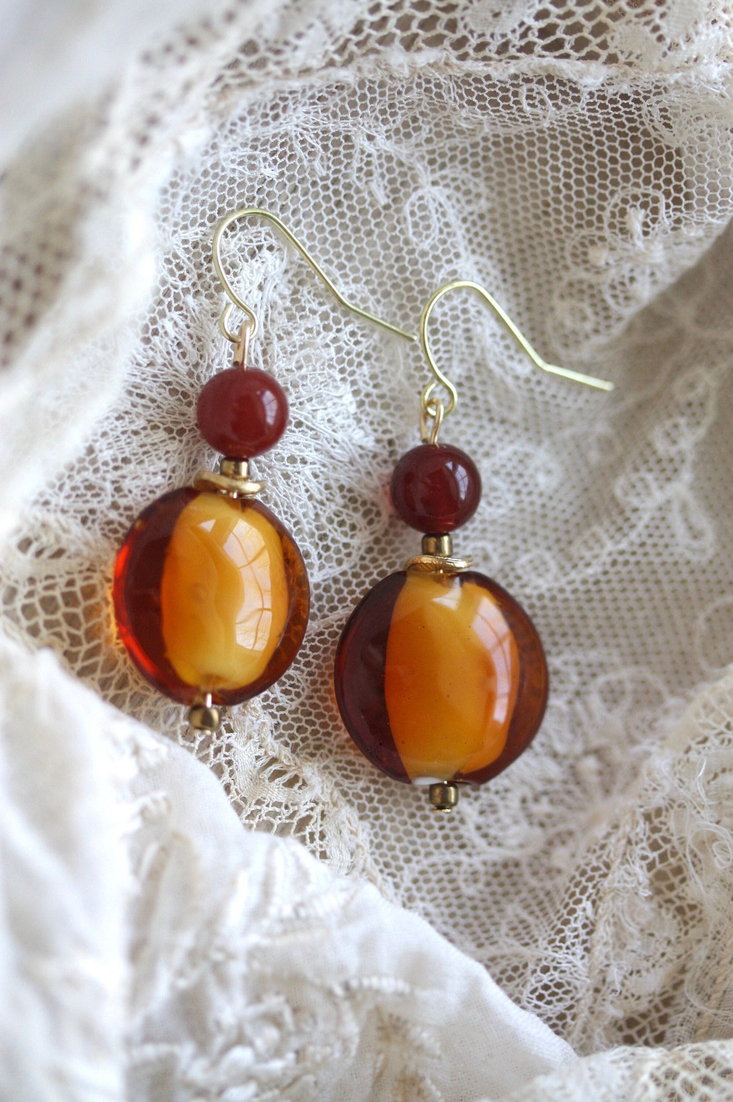 Orange and deep red dangle earrings