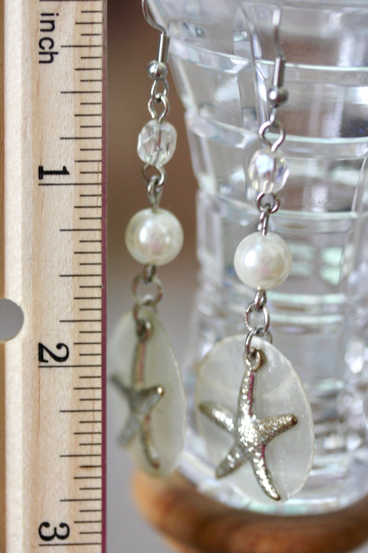 Capiz shell, faux pearl and silvertone starfish beach themed dangle earrings