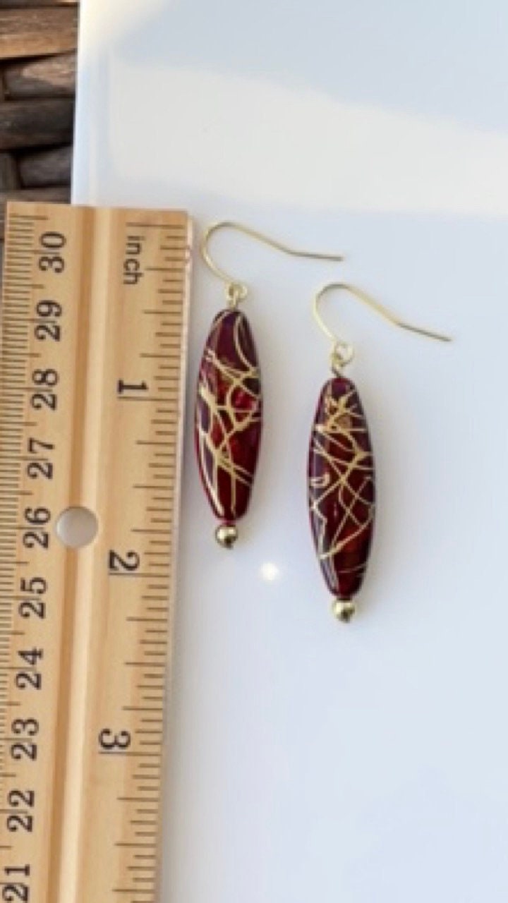 Handmade earrings with upcycled vintage red and gold swirled vintage oval dangles - perfect for the Christmas holidays