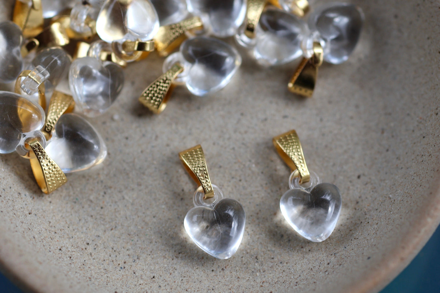 One dozen clear heart pendants - can be used as necklace pendants or for making earrings