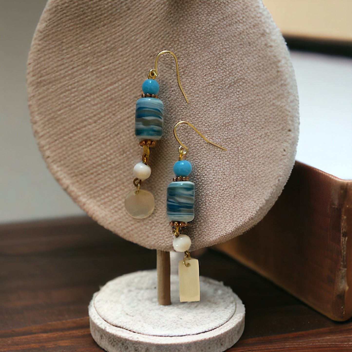 Shades of blue swirled glass with mother of pearl dangles - handmade earrings