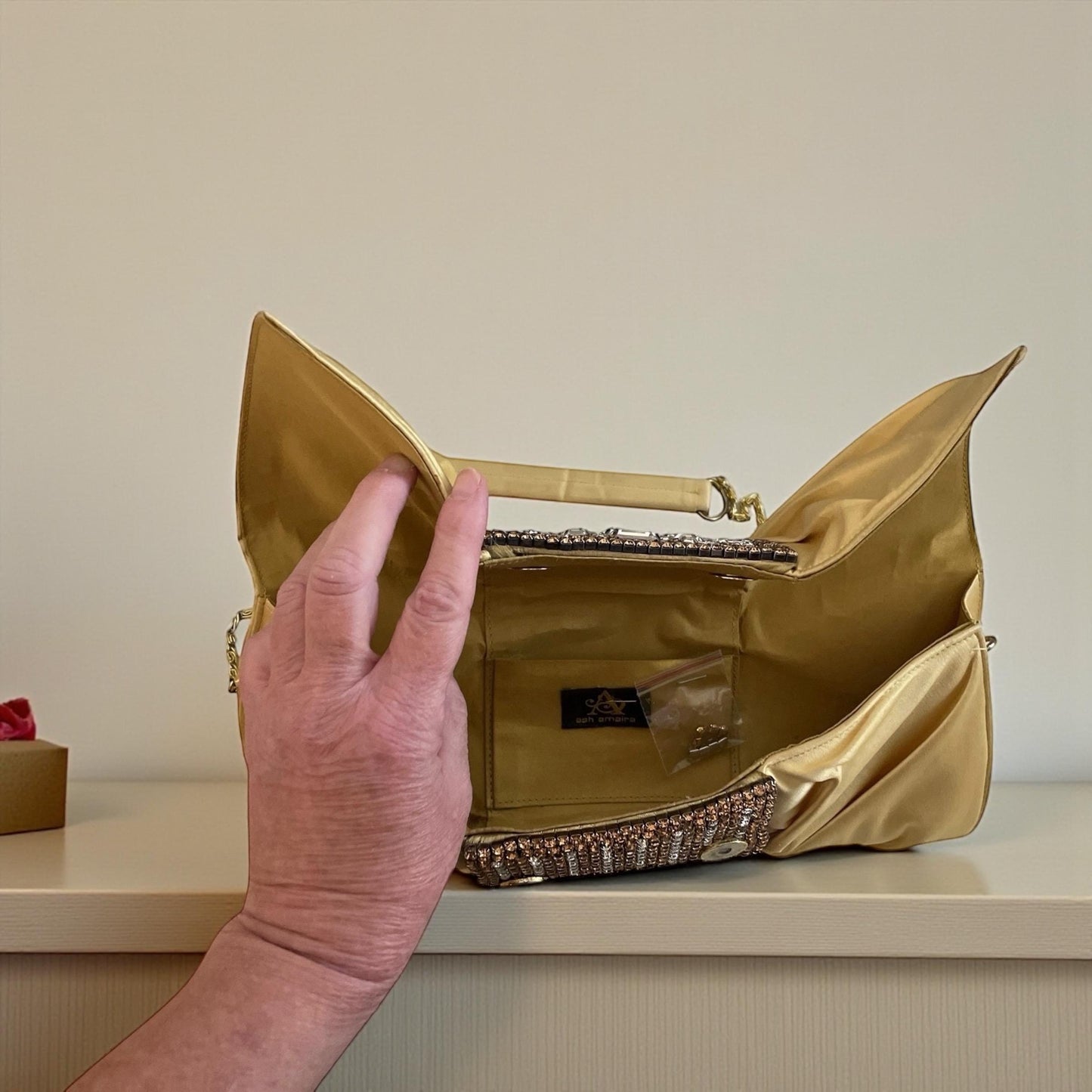 Gold Satin Clutch – Designer Evening Bag with Hand-Set Crystals & Bow Silhouette