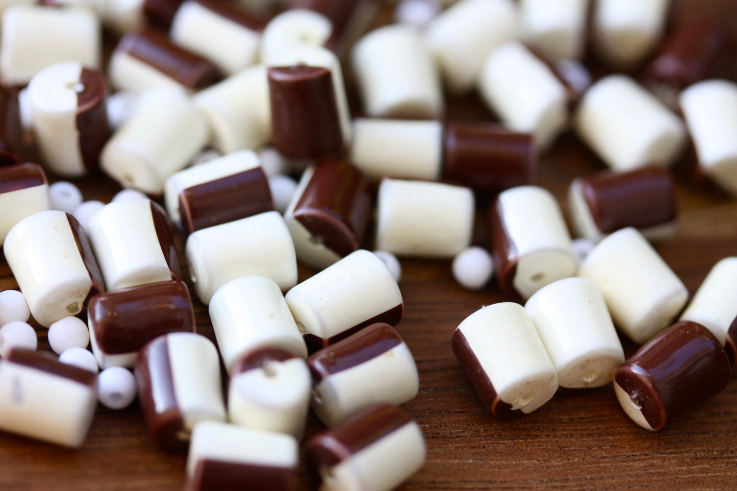One dozen unique half brown, half creamy white vintage beads