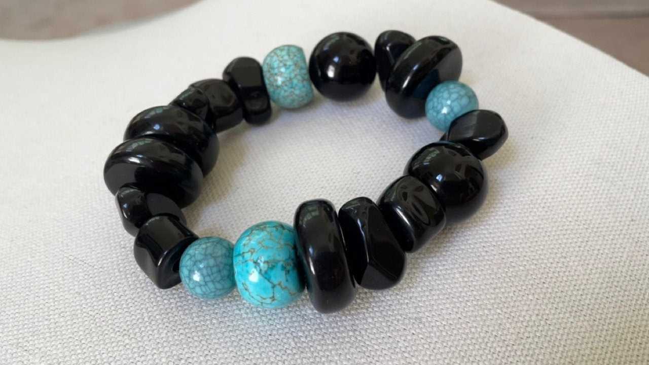 Stunning vintage mixed sizes and shapes of black and faux turquoise beaded bracelet