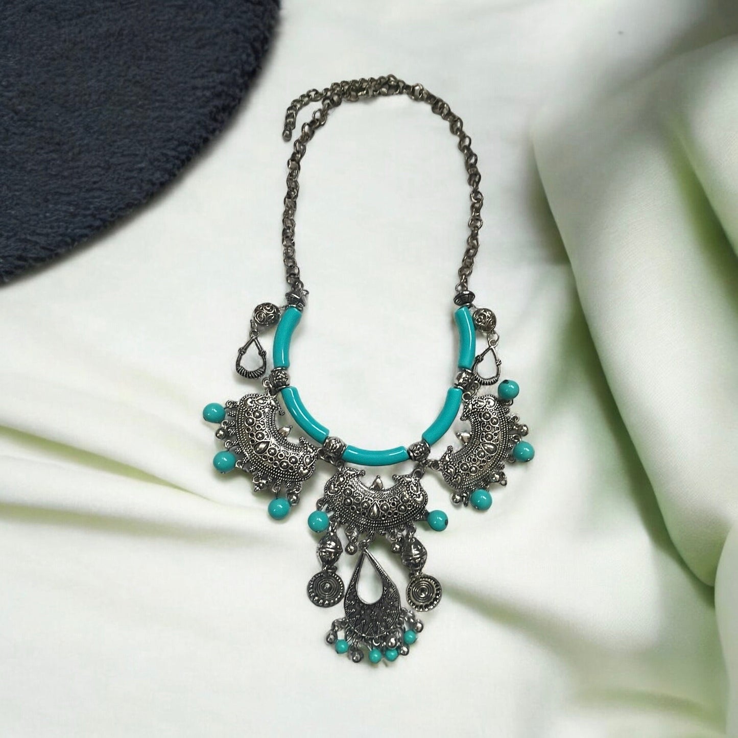 Exotic Indian style necklace with turquoise beaded balls/tubes and ornate silver trim