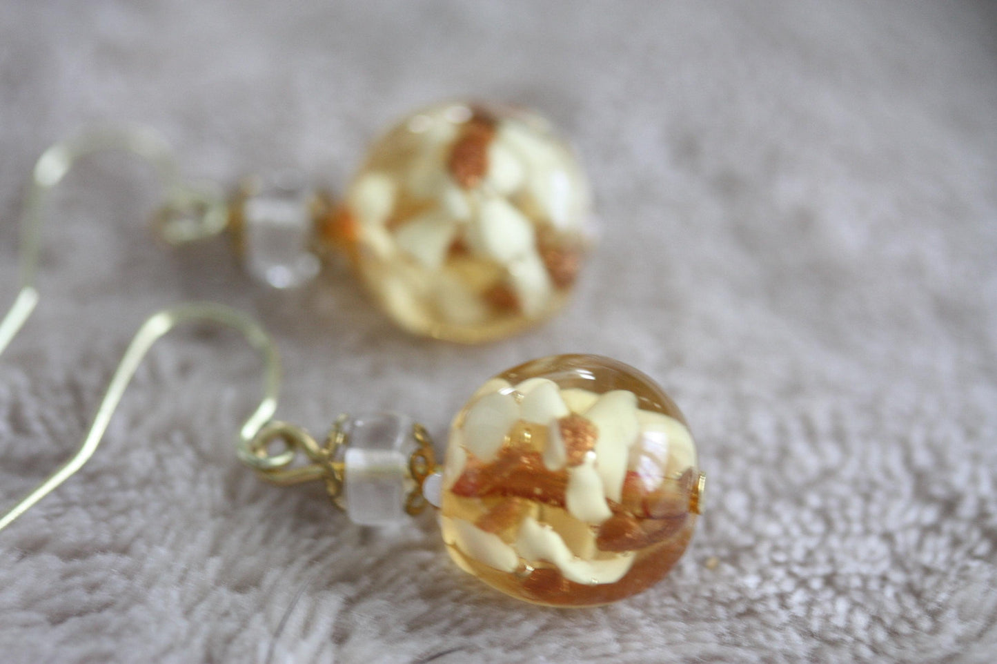 Stunning yellow and gold blown glass earrings with goldstone filigree - 1 and 1/4"