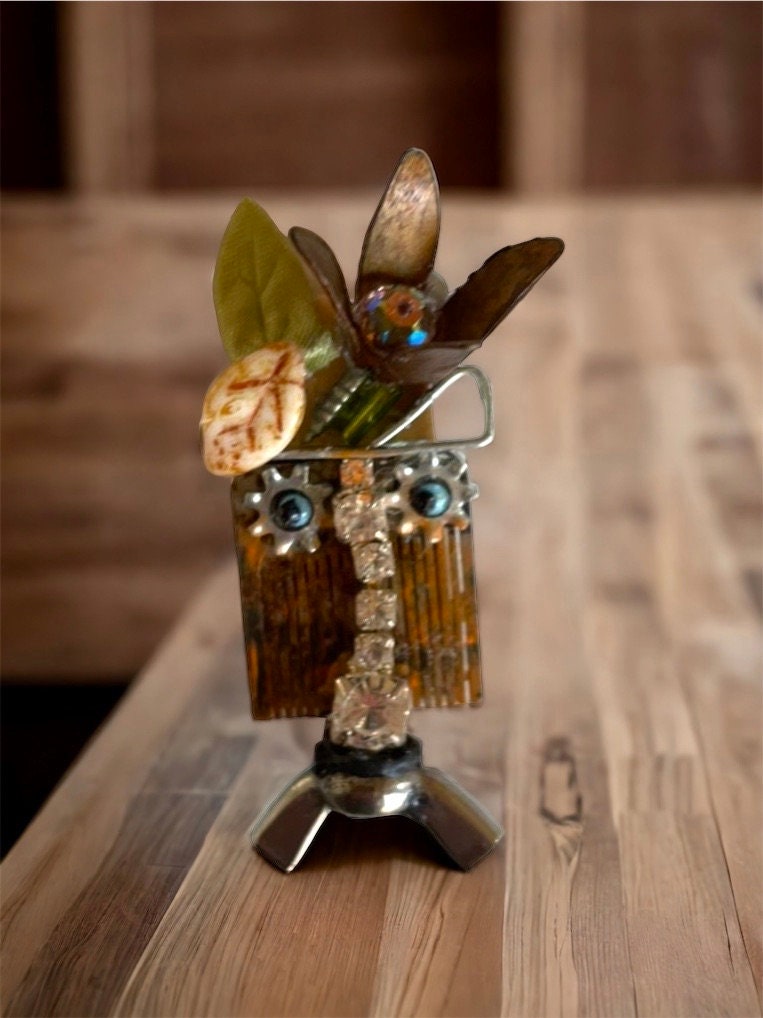 Meet "Gert" a mixed material piece made of parts of a vintage Swiss music box, along with hardware - pin or necklace pendant