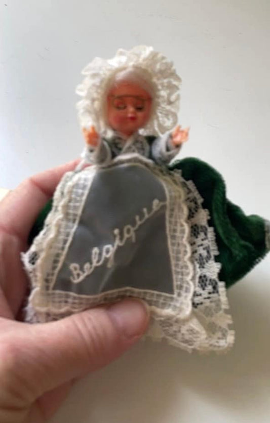 Stunning vintage collectible art baby Doll from Belgium with green velvet dress and lace overlay