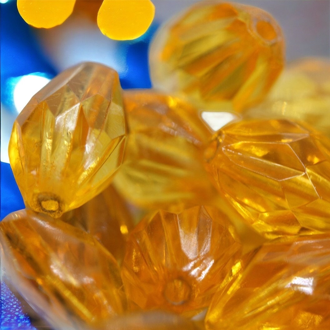 Orange oval faceted vintage beads - approx. 15 mm