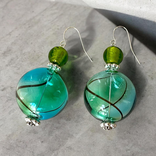 Shades of green and blue blown glass dangle earrings