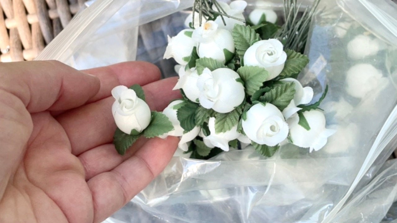 Three dozen (36) individually wire stemmed faux flowers - available in 3 colors - blue, yellow or white