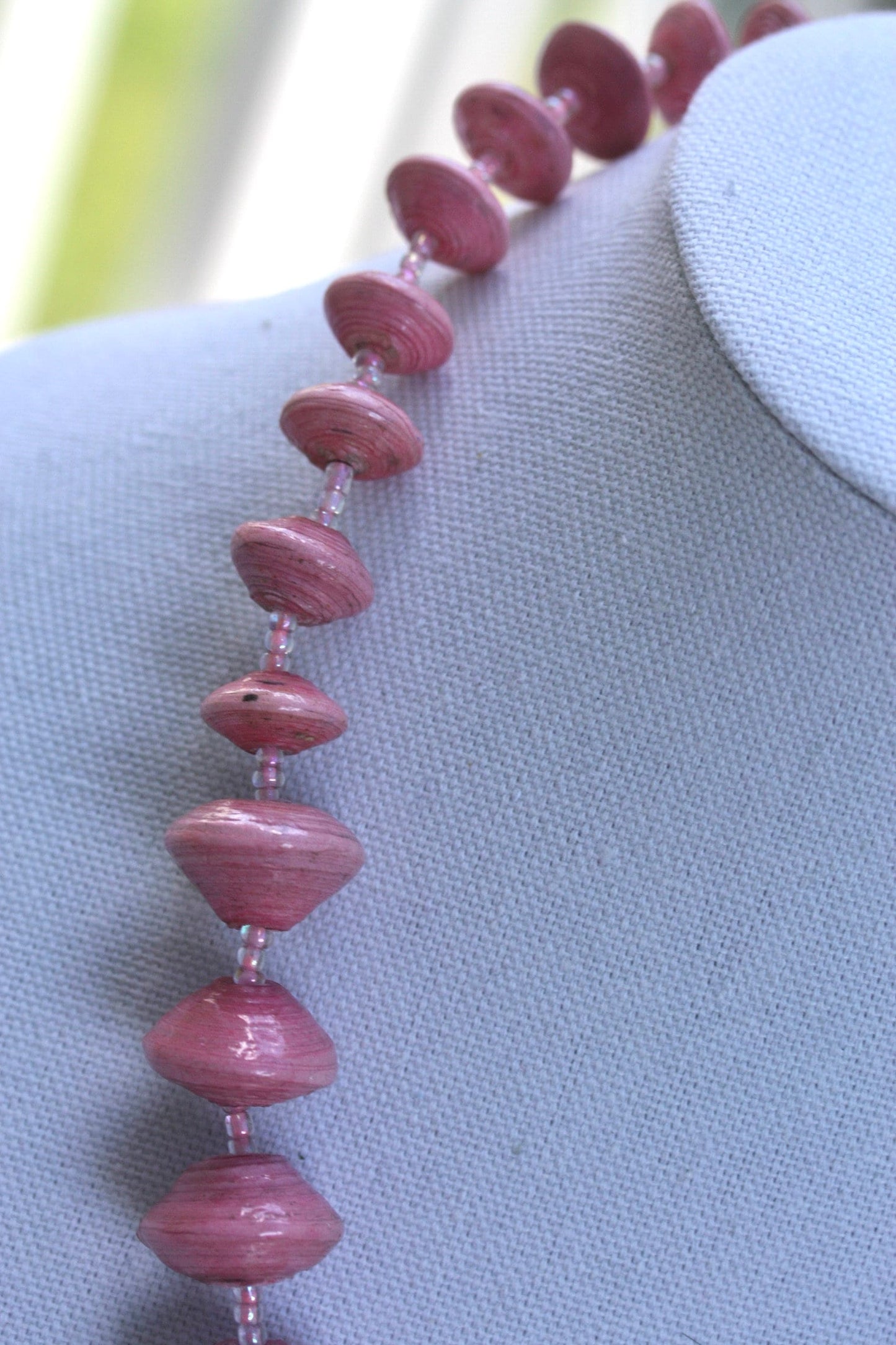 Long vintage various sized rolled paper light pink necklace