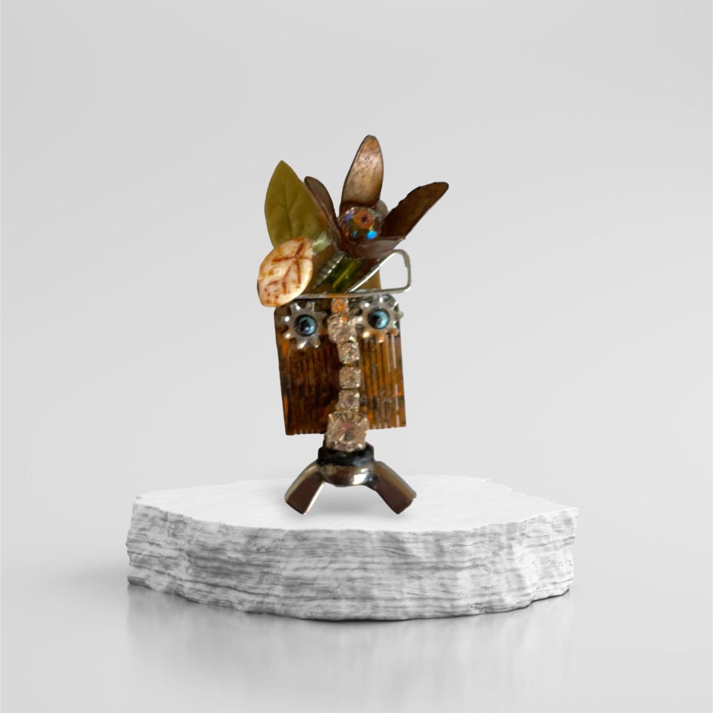 Meet "Gert" a mixed material piece made of parts of a vintage Swiss music box, along with hardware - pin or necklace pendant