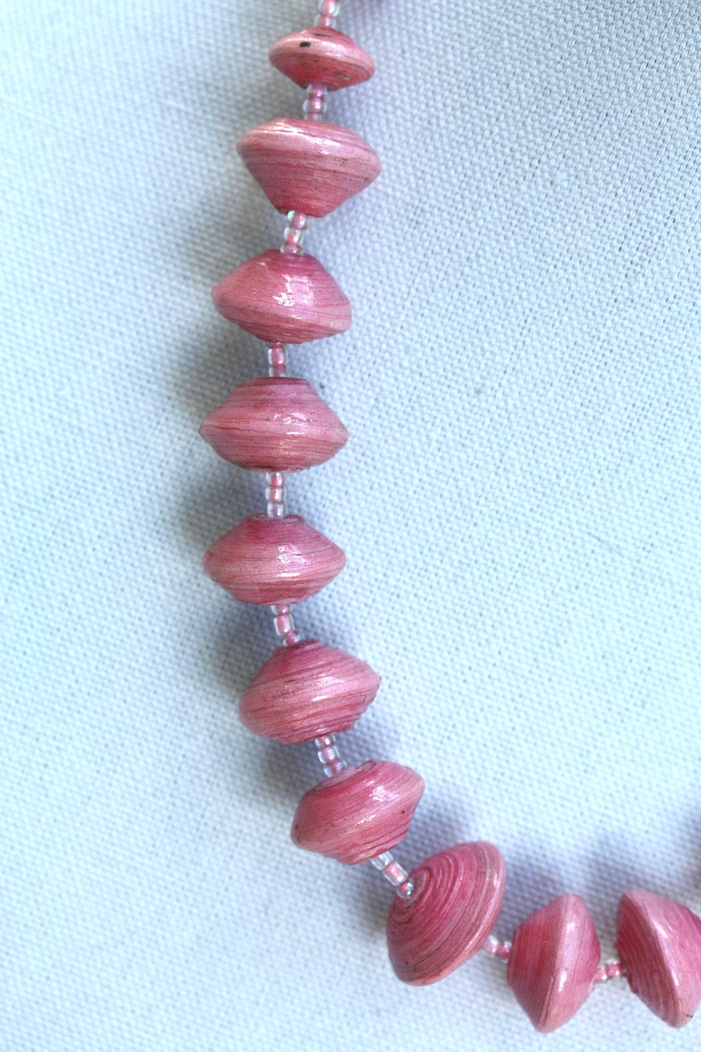 Long vintage various sized rolled paper light pink necklace