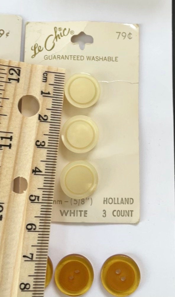 Lot of vintage buttons - from Holland and elsewhere - shades of yellow, gold and cream