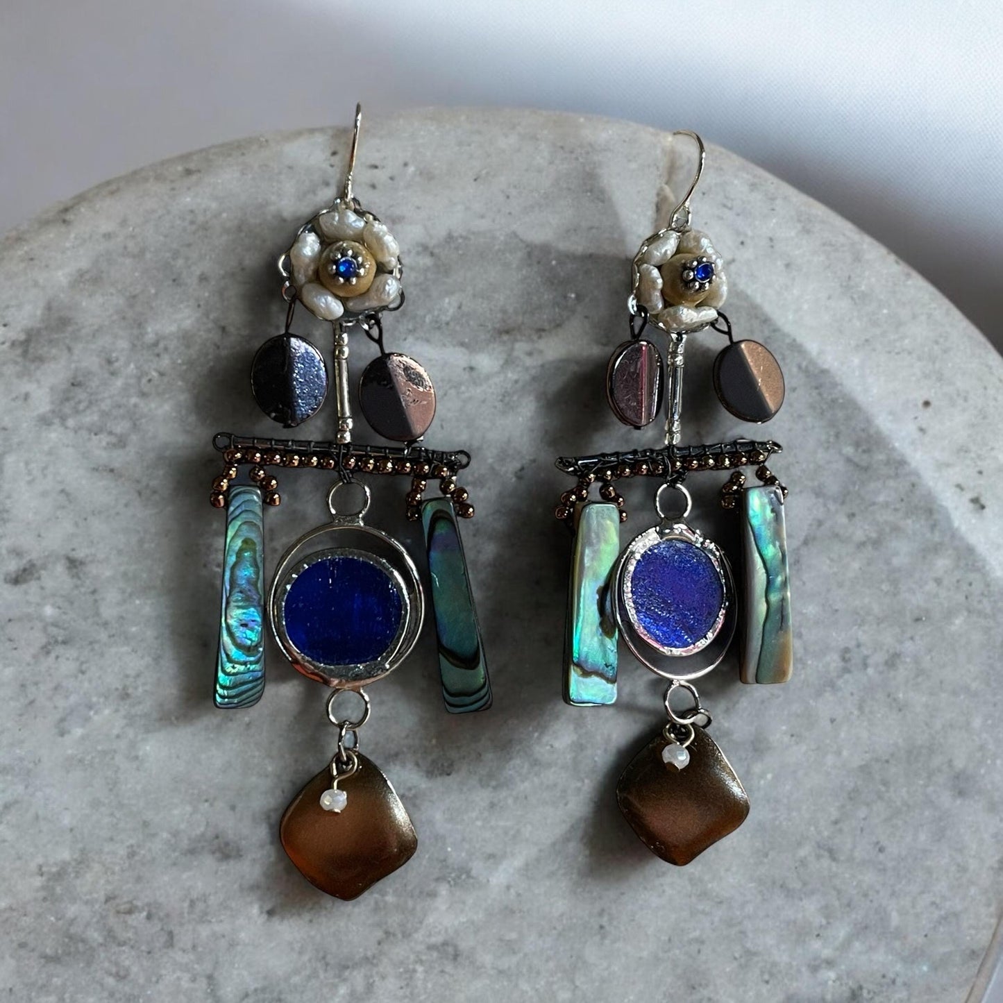 Abalone mixed media collage earrings with mixed metals and findings, pearls, wood, beadwork and abalone shells; Sterling silver ear wires
