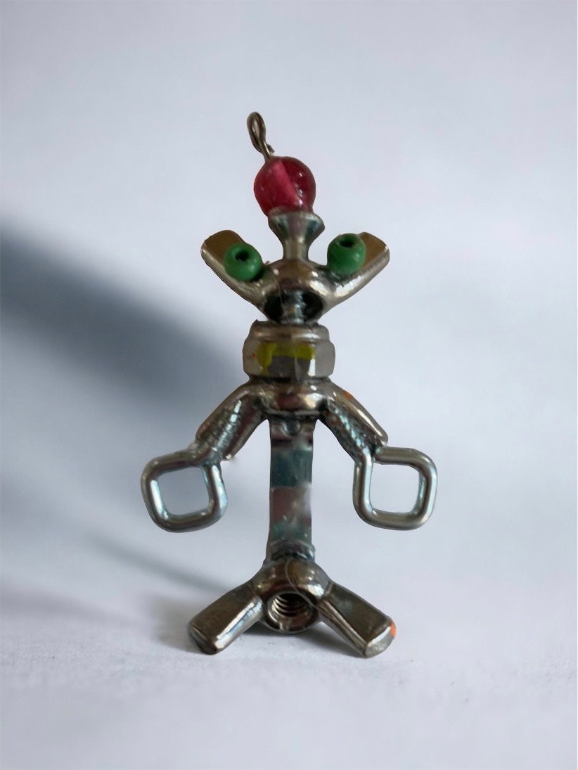 Meet "Herman" -  mixed media robot made of hardware - nails, screws, bolts with small wood/glass embellishments - pin or necklace pendant