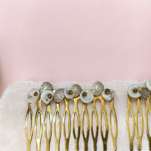 Pair of stunning hand beaded white and striped shell hair combs with burnt orange-gold glass seed beads on goldtone metal hair combs