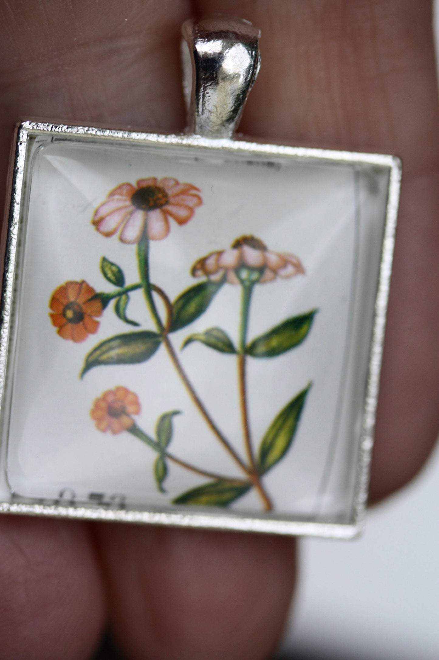 Necklace pendants made from genuine vintage and antique postage stamps from around the world - Australia, Argentina, Afghanistan, folk art