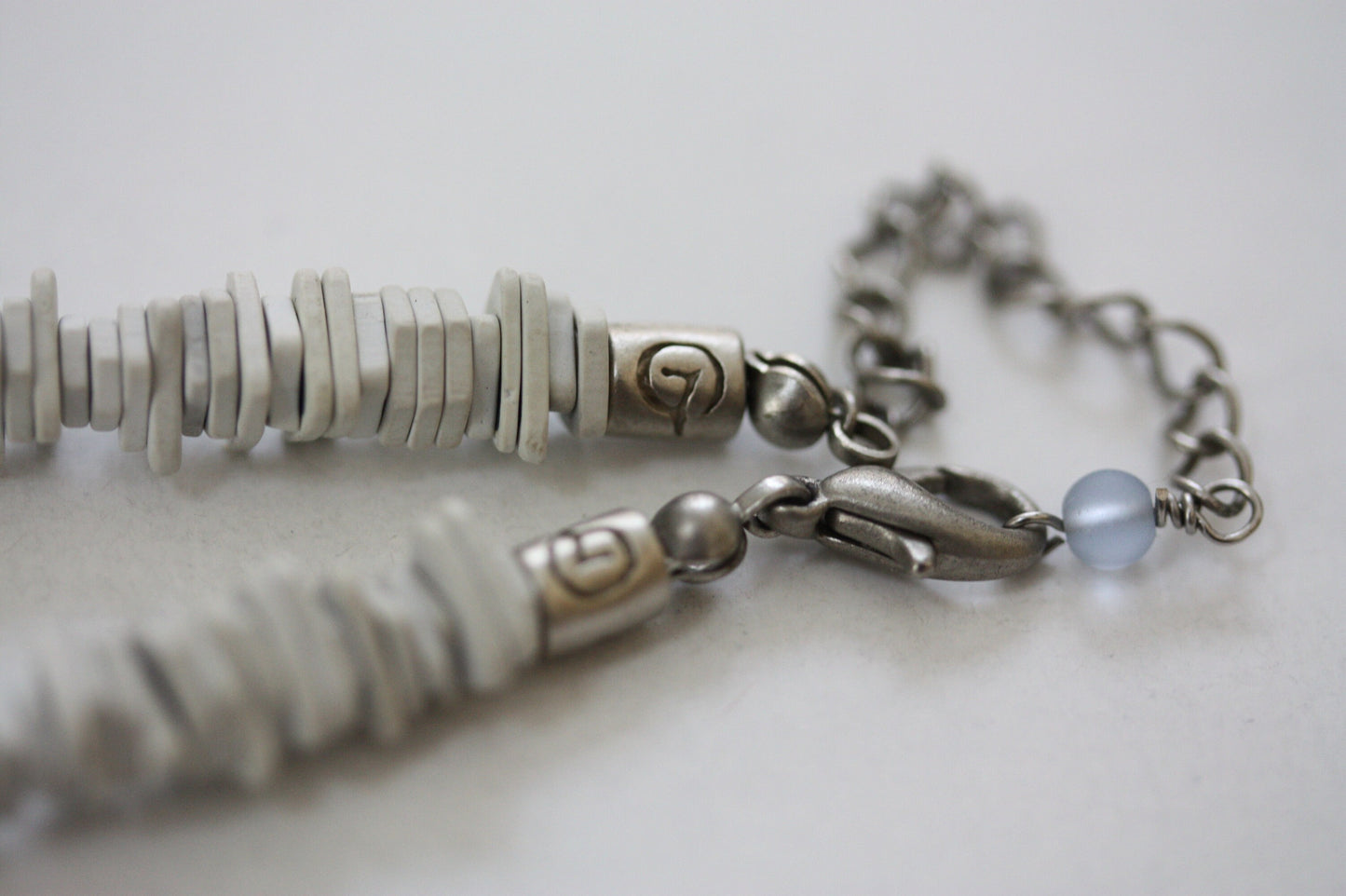 Unique vintage necklace with white shell heishi beads with blue semi precious stone chips