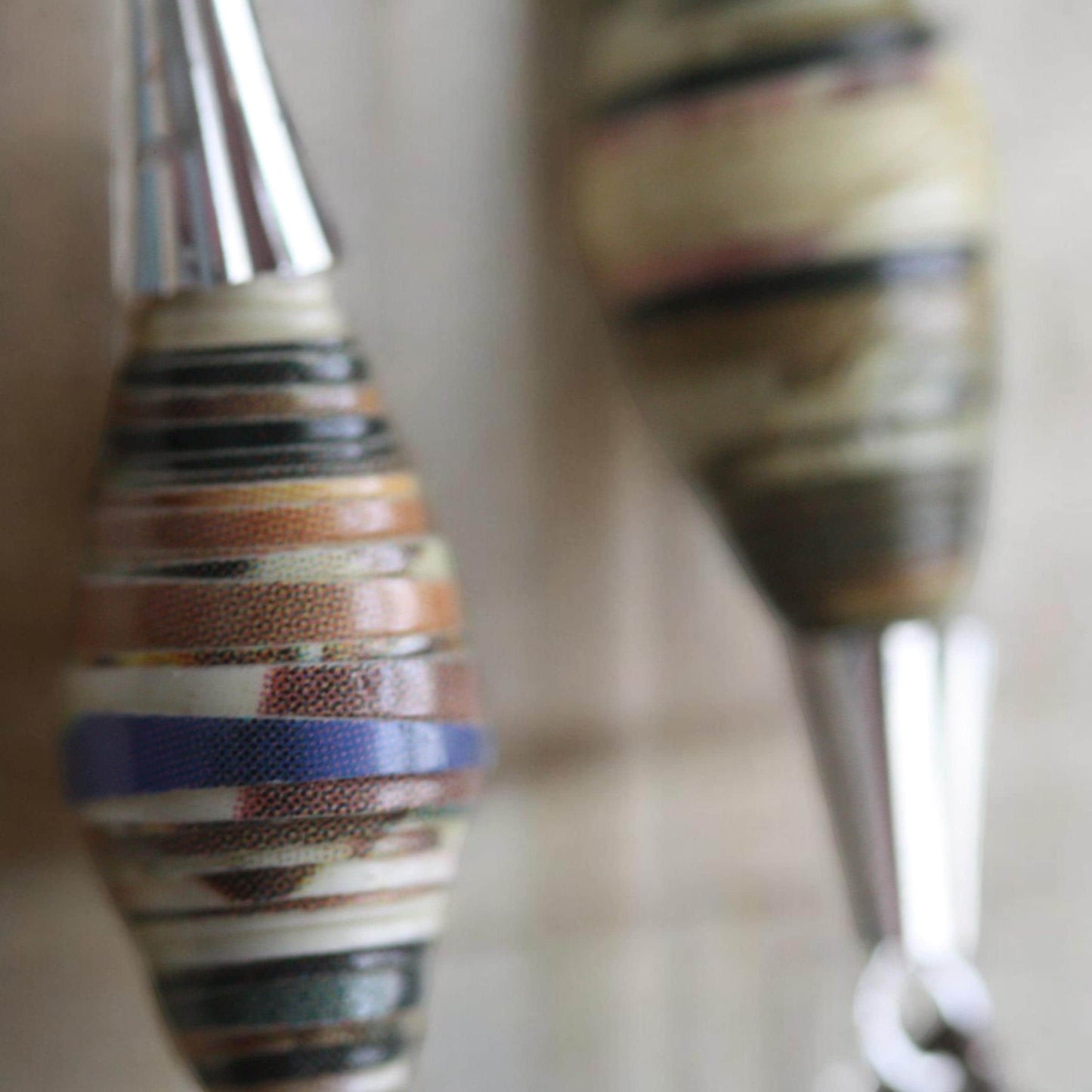 Oval rolled paper with cone metal caps and teardrop dangles - handmade earrings - 2" long