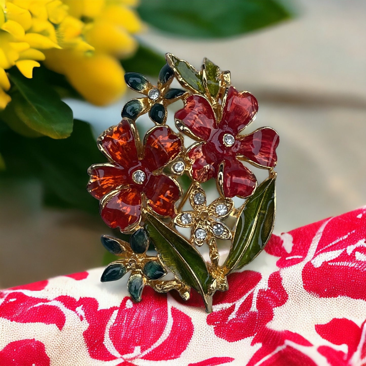 Stunning enamel floral pin with rhinestones