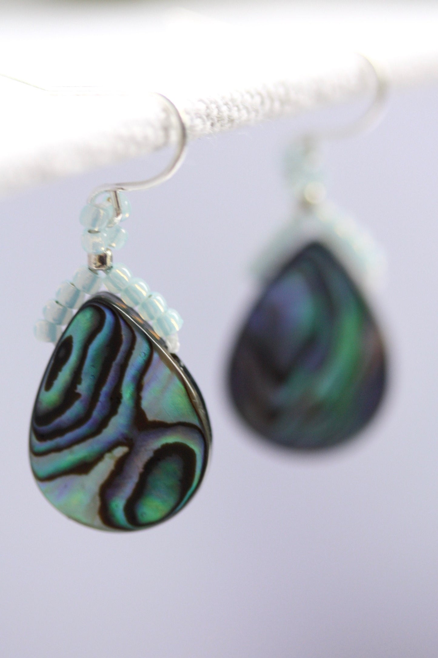 Beaded abalone shell teardrop shaped dangle earrings with sterling silver ear wires