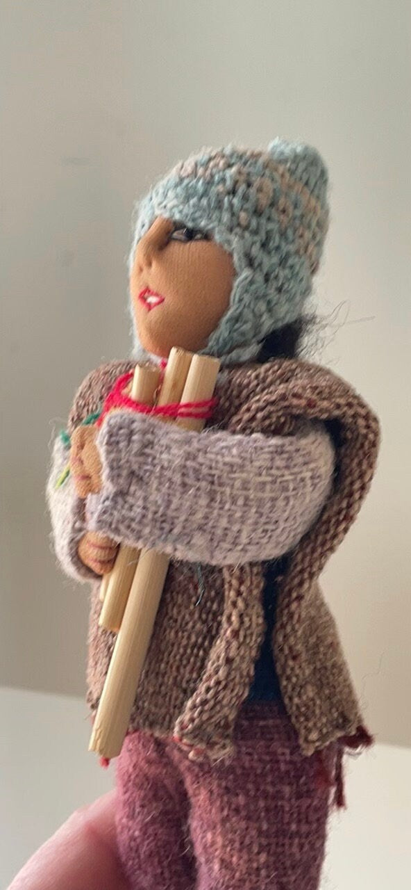 Vintage Bolivian man playing panpipes - collectible folk art doll with handmade woven wool clothing