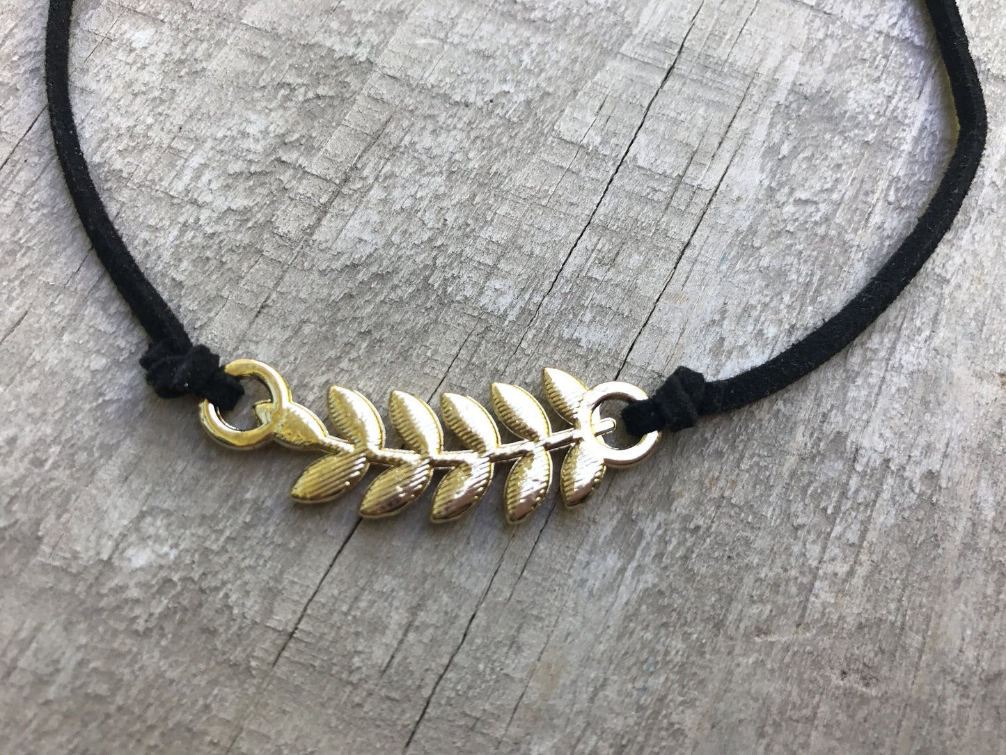 Vintage Rhinestone feather on black vintage necklace