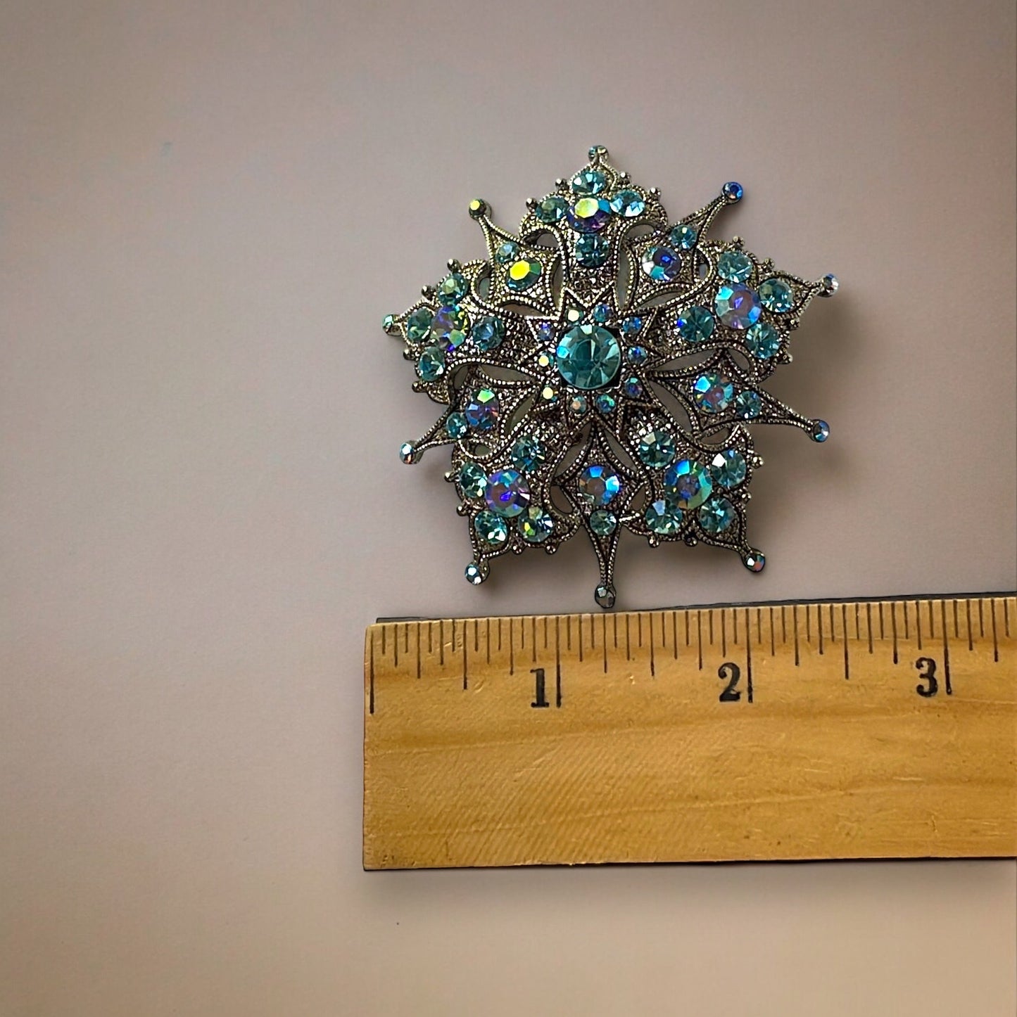 Magnificent vintage pin loaded with blue AB rhinestones