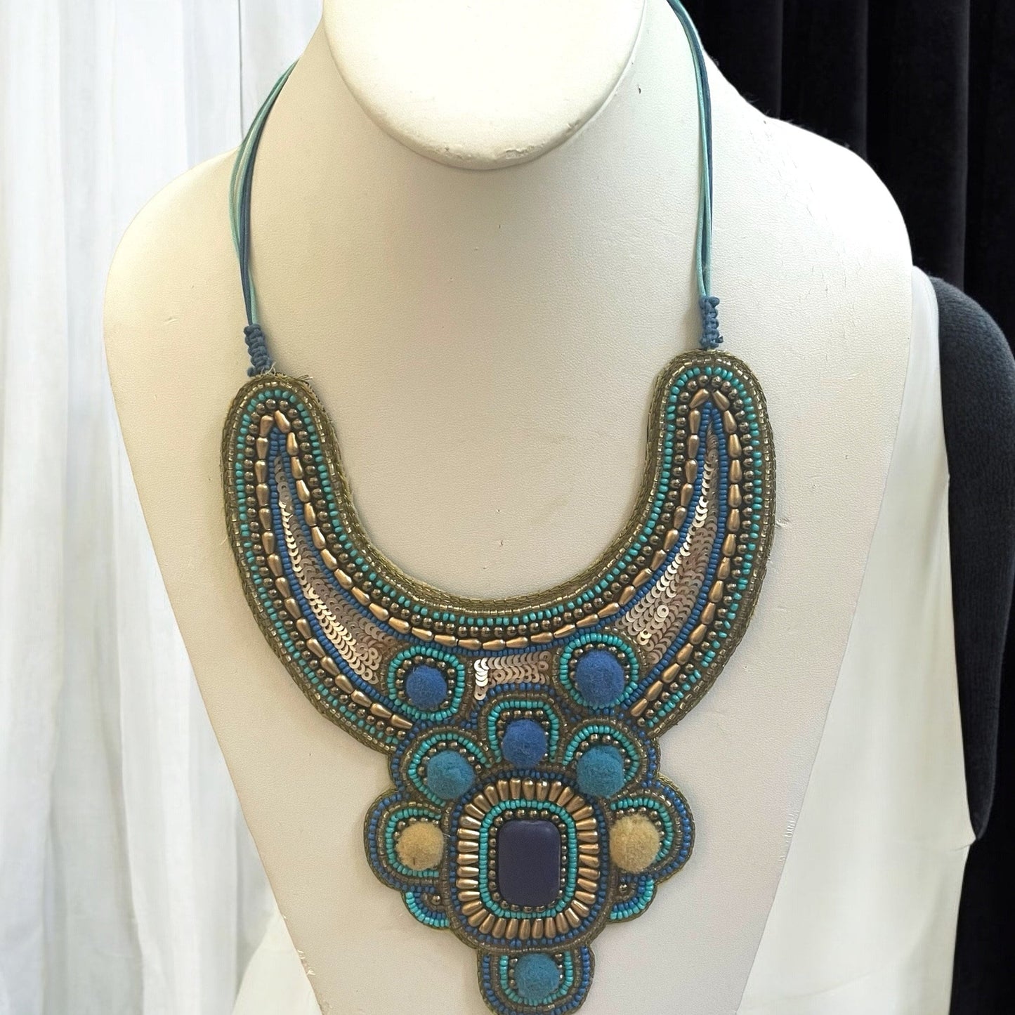 Stunning beadwork necklace - mixed materials with sequins, pom poms and beads - turquoise
