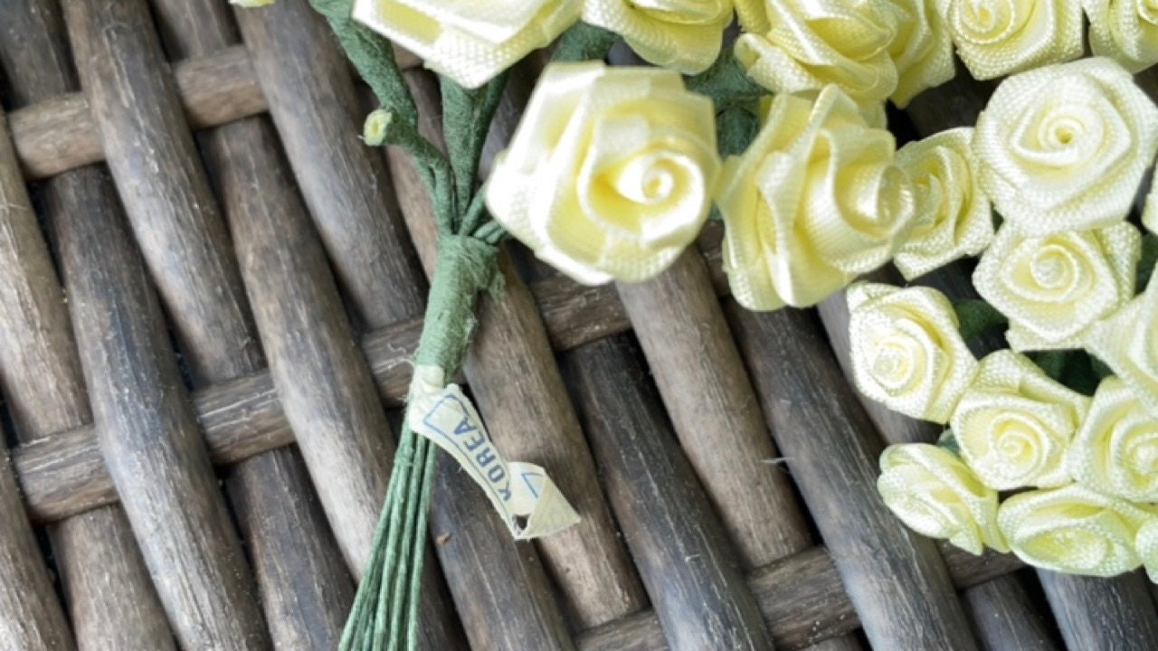 Three dozen individually wire stemmed faux flowers - available in 3 colors - yellow, cream or white