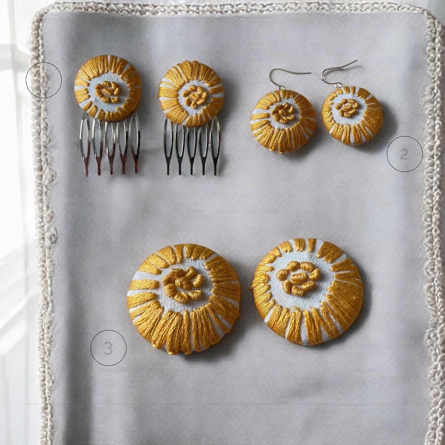 Choice of stud earrings, dangle earrings, hair combs, shanked buttons or pins all hand made from a vintage linen embroidered table runner