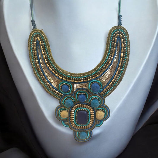 Stunning beadwork necklace - mixed materials with sequins, pom poms and beads - turquoise