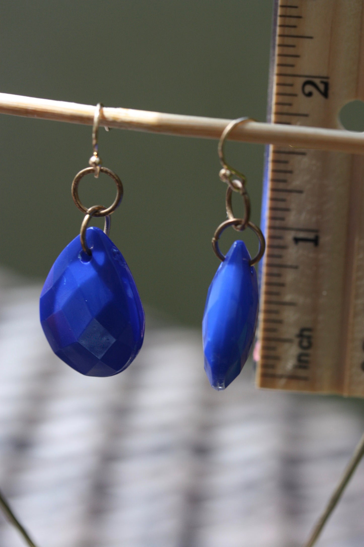 Royal blue faceted teardrop-shaped dangle earrings