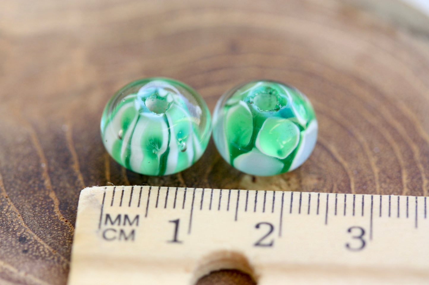 Two stunning vintage glass beads - shades of green and white