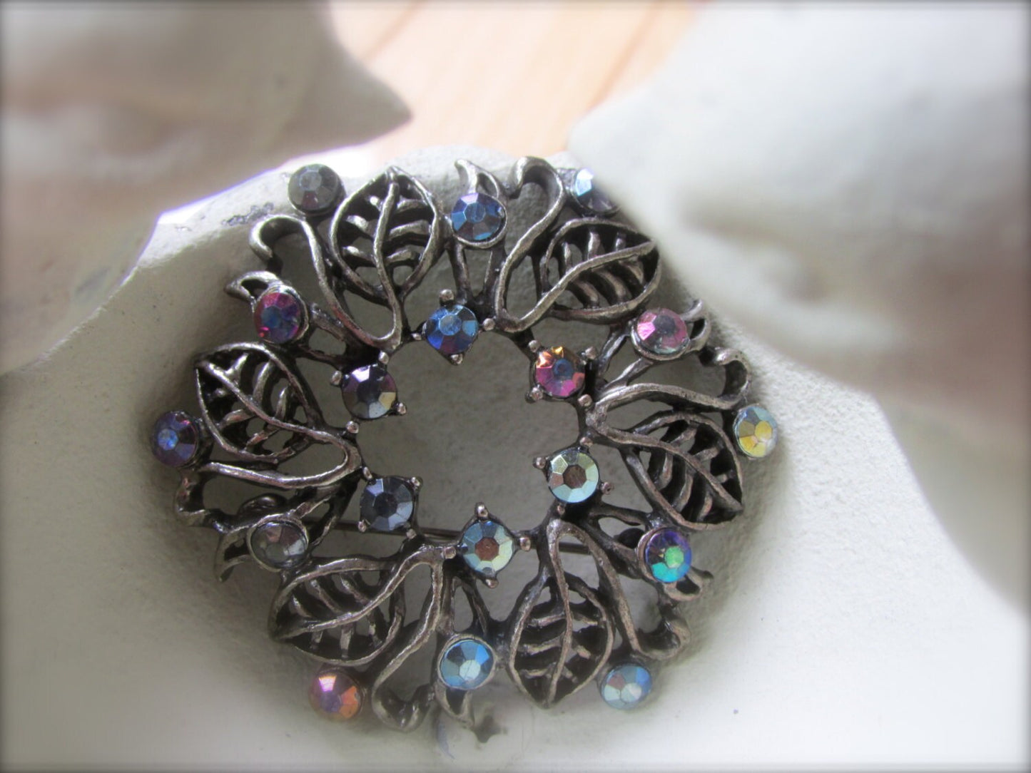 Vintage silver leaf and rhinestone wreath pin