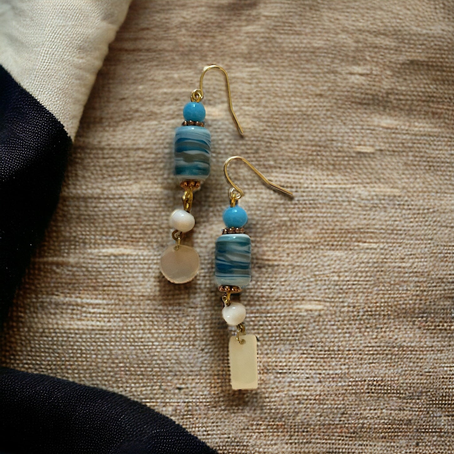 Shades of blue swirled glass with mother of pearl dangles - handmade earrings