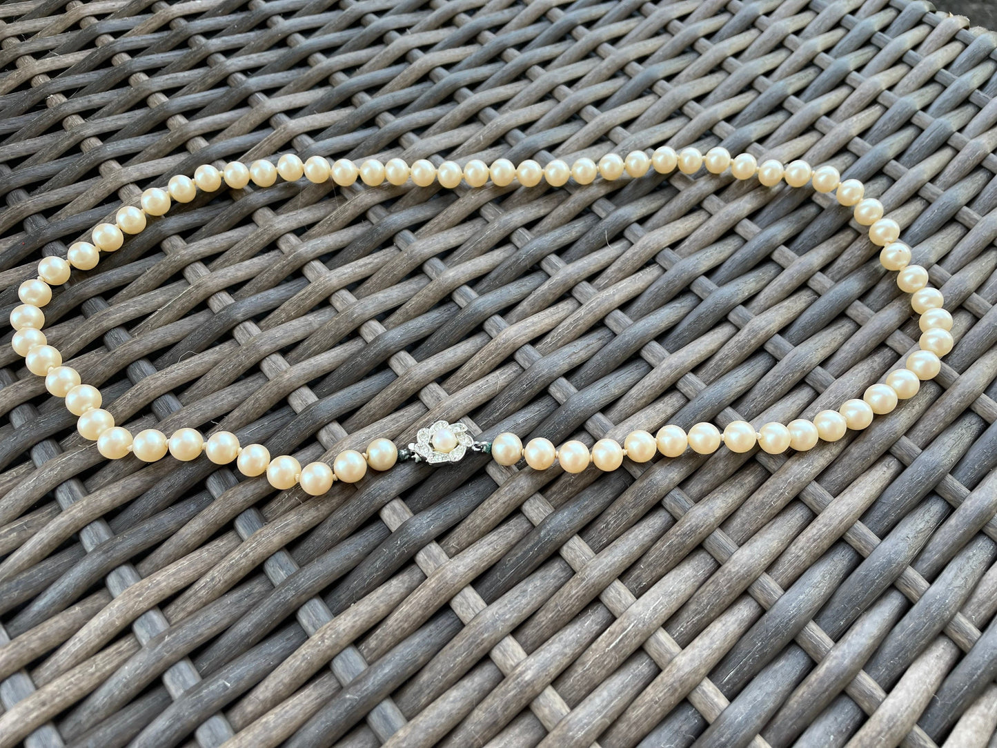 Elegant single strand vintage faux pearl necklace with beautiful rhinestone clasp
