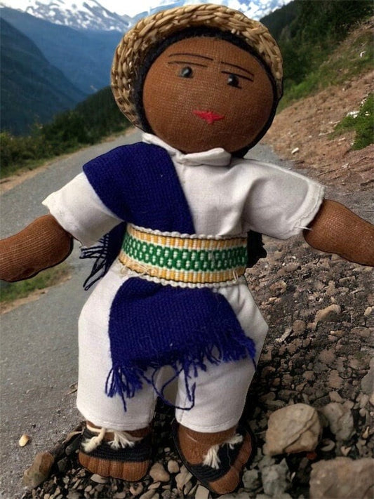 Stunning vintage Mexican girl doll with braids and authentic clothing with straw hat