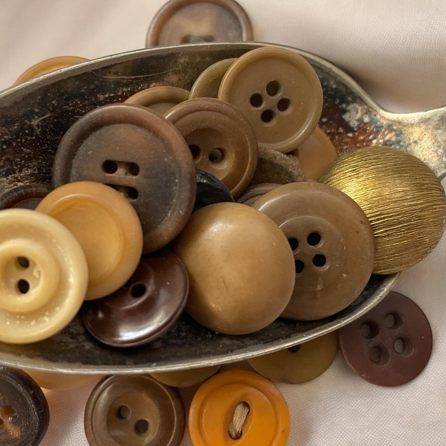 Buttons by the ounce - mystery lot of gold, brown, tan and cream vintage buttons - mixed sizes and materials - as found