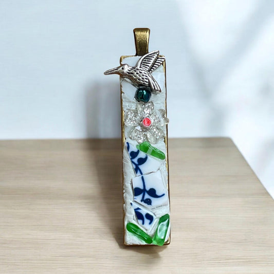 Handmade inlaid mixed material mosaic necklace - bird on a flower - tile from vintage plates, metal, glass chips, millefiori